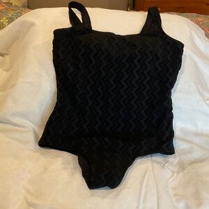 Black women’s One Piece swim suit.